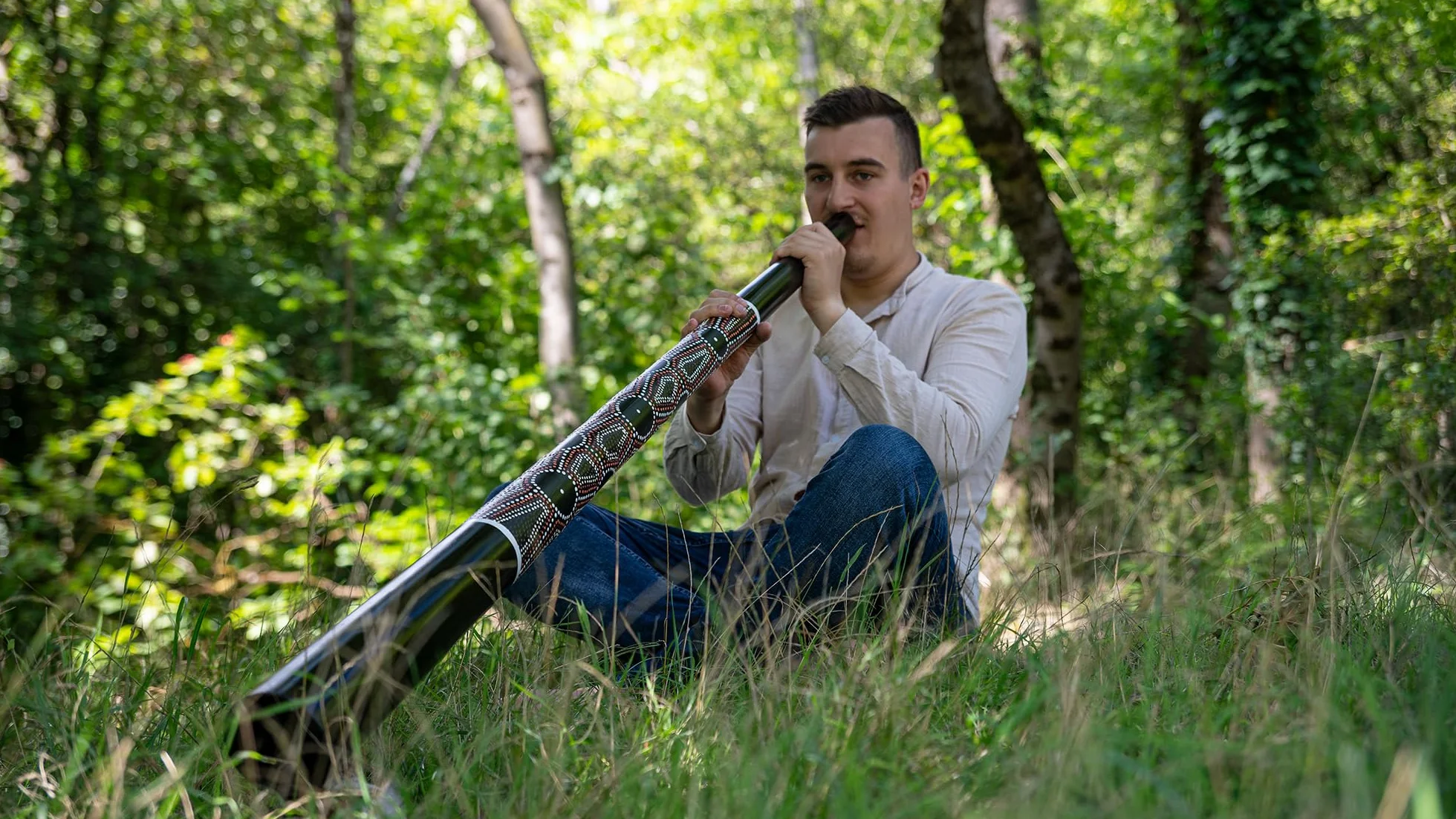 Sonic Energy Sliced Pro Didgeridoo – Składany instrument podróżny – Tonacja E – Drewno mahoniowe, czarne kropki (DDPROFPE)